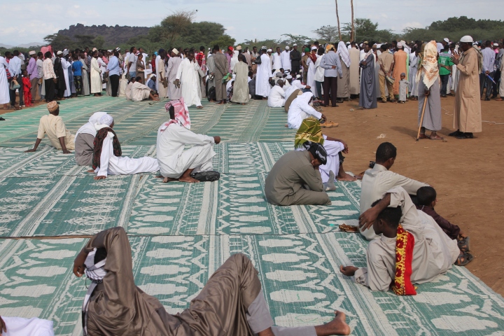 Prayer mats spread out in the field